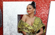 Rihanna narrowly avoids flashing crowd as her gold dress slips down at Oceans 8 premiere